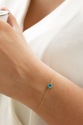 "Altın Nazarlı Bileklik, 0,86 gram olup Altın Nazar Boncuklu Bileklik modellerinden biridir. Ağırlığı ve zarif tasarımıyla stilinizi tamamlar