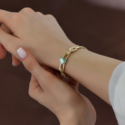 14 Ayar Altın Mineli Kalpli Zincir Bileklik, 7,52 gram tasarımıyla Altın Bileklik kategorisinde, Goldium imzasıyla modern bir görünüm sunar.