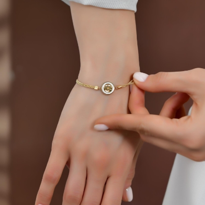 14 Ayar Altın Mineli Kutup Yıldızı Figürlü Bileklik, 4,87 gram, Goldium ustalığı ve Altın Bileklik modeli ile uzun ömürlü kullanım sağlar.